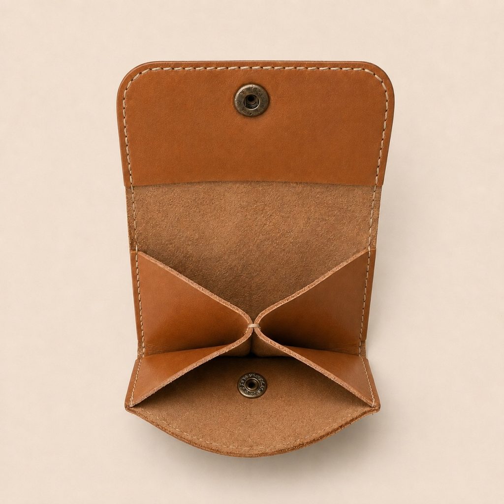 Tan Leather Coin Pouch with Accordion Compartments Handmade in Hoi An Handmade tan leather wallet with accordion compartments at Meadows Hoi An