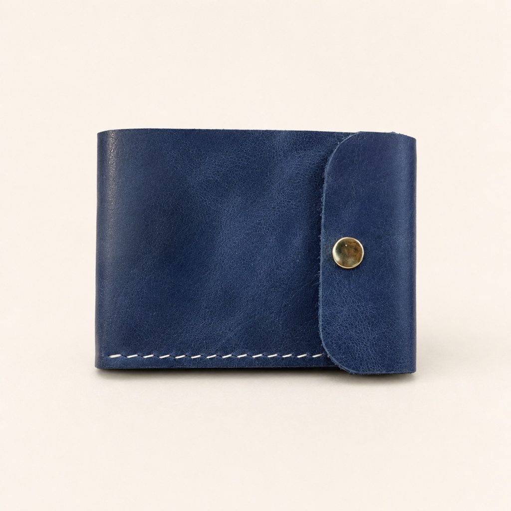 Blue Snap Leather Wallet 2-Hour Workshop in Hoi An Blue leather wallet with snap closure for the 2-hour workshop in Hoi An