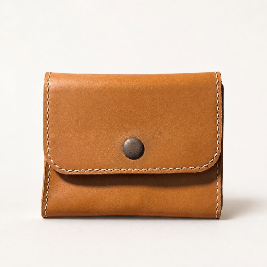 Tan Leather Coin Pouch with Snap Closure Handmade tan leather snap wallet from a leather workshop in Hoi An